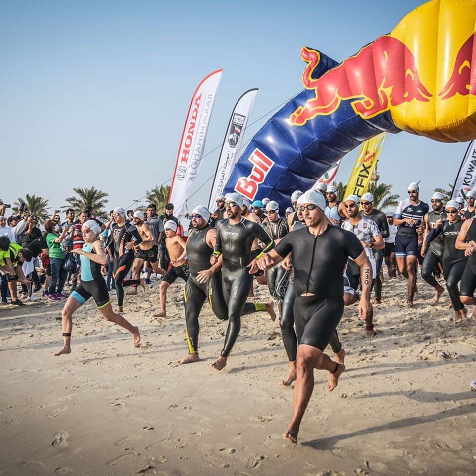 Team of volunteers working together to clean up desert area