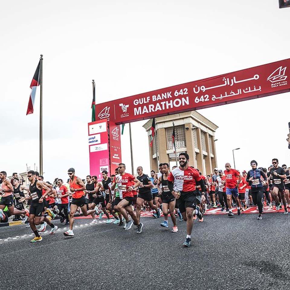 Team of volunteers working together to clean up desert area
