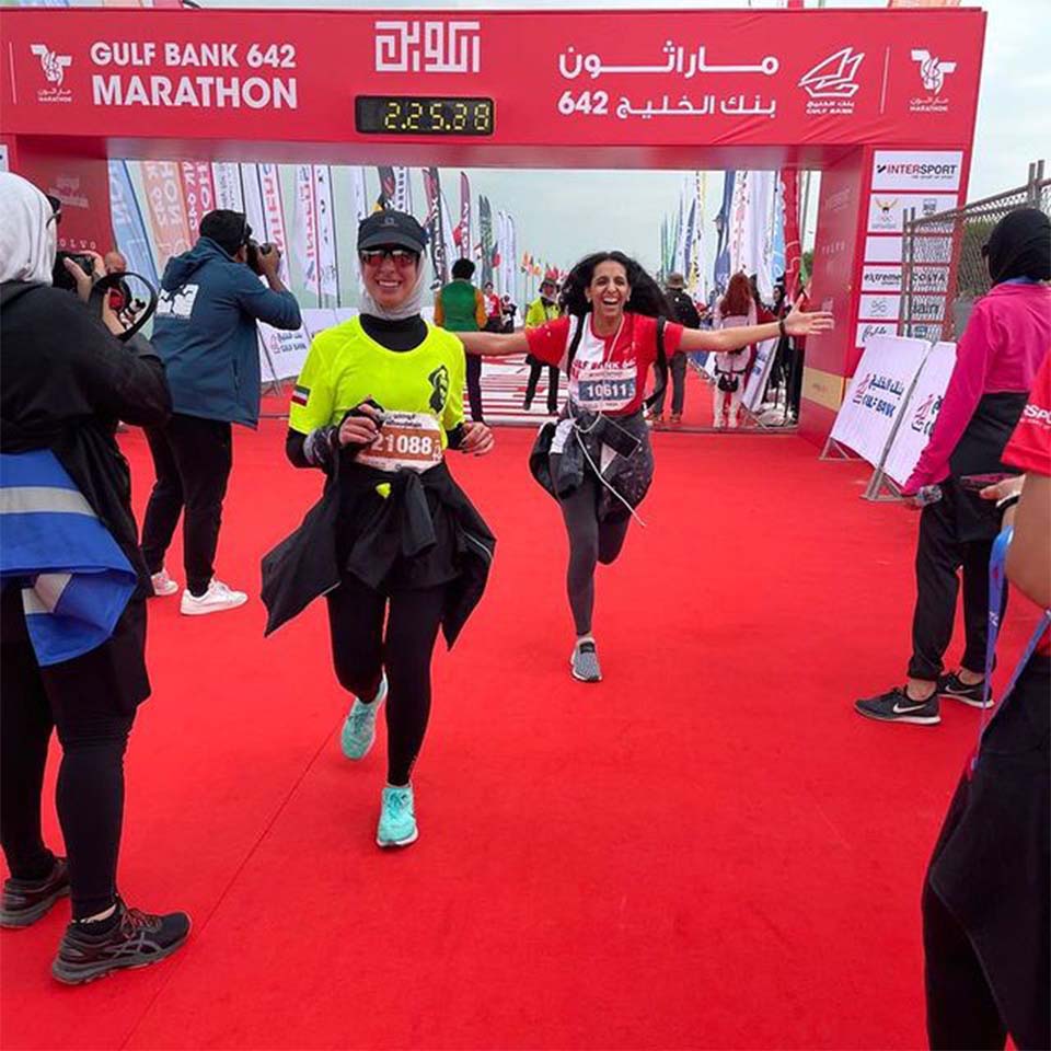 Team of volunteers working together to clean up desert area