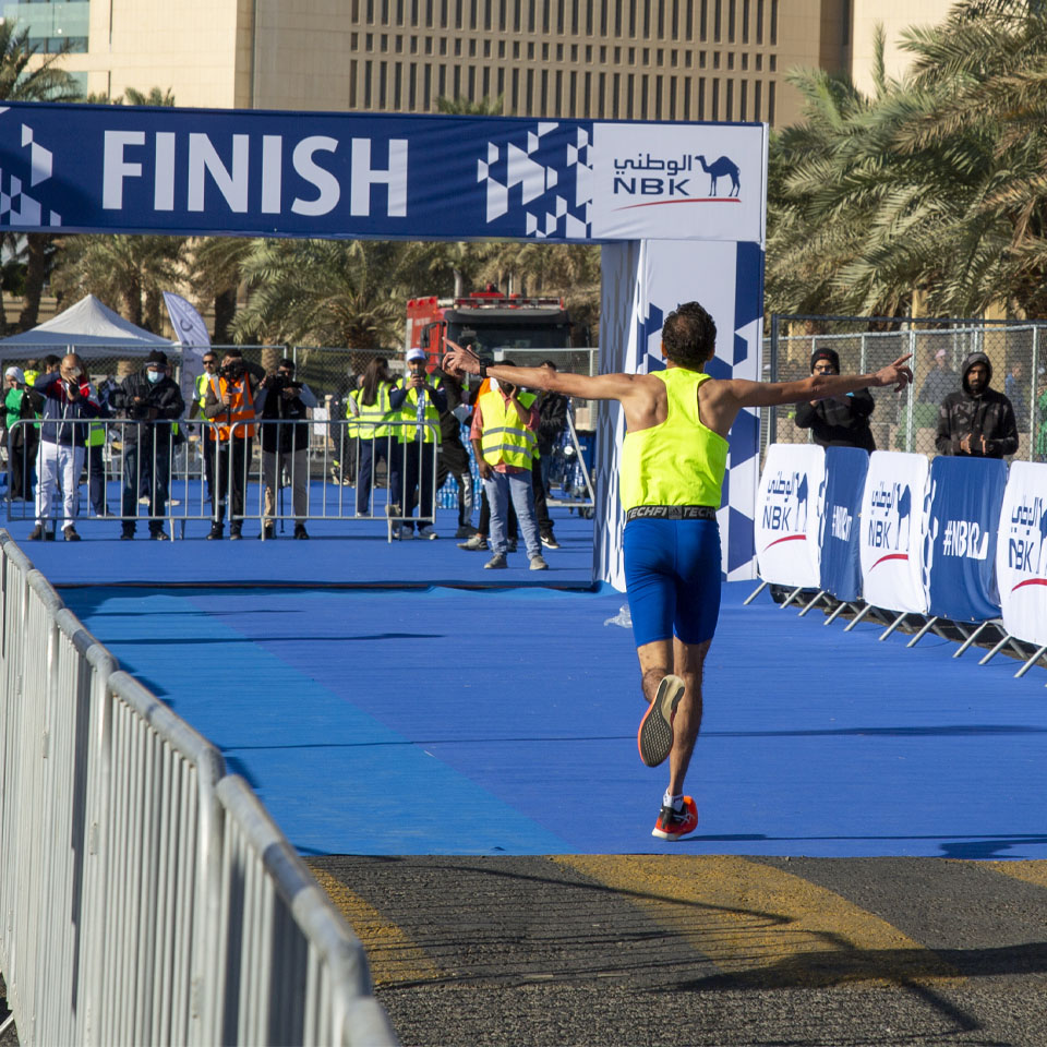 Team of volunteers working together to clean up desert area