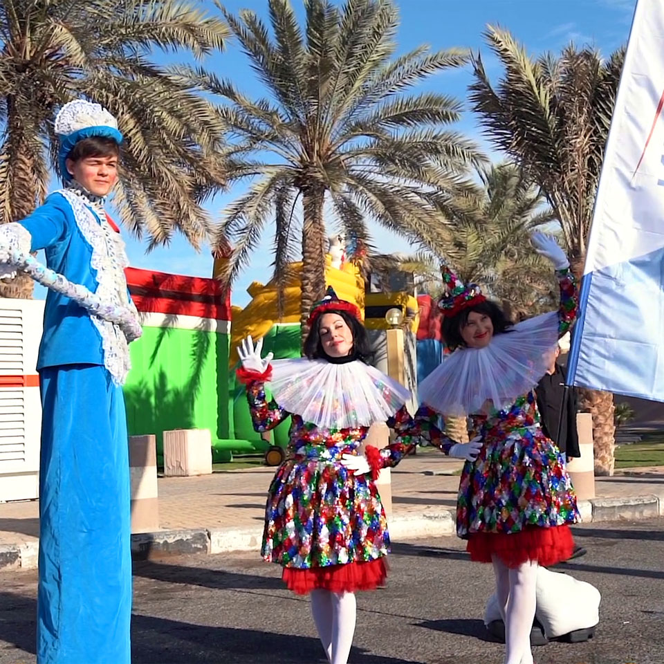 Team of volunteers working together to clean up desert area